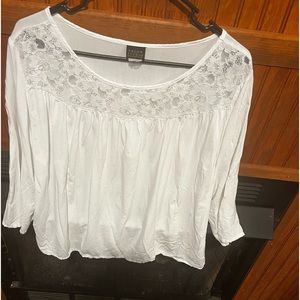 Pretty little three-quarter length sleeve top with lace. Excellent condition